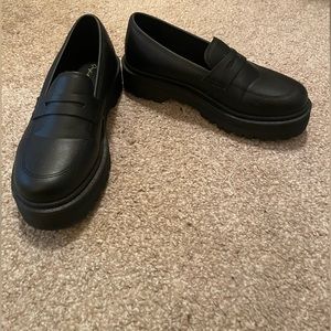 Black faux leather Lug sole platform loafers